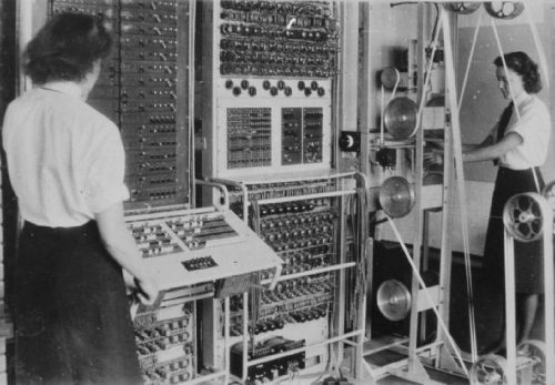 A Colossus Mark 2 computer. The operators are (left to right) Dorothy Du Boisson and Elsie Booker.