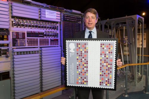 TNMOC Chairman Tim Reynolds with the Colossus stamp
