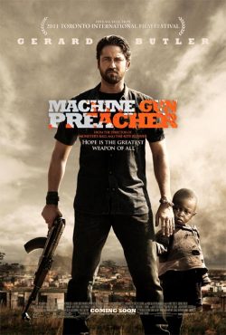 Machine_Gun_Preacher_Poster_Has_Gerard_Butler_Protecting_Child_1313468614