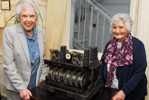 Colossus veterans, Betty O’Connell and Irene Dixon, get up close with a Lorenz SZ42 that sent messages that Colossus was designed to break.
